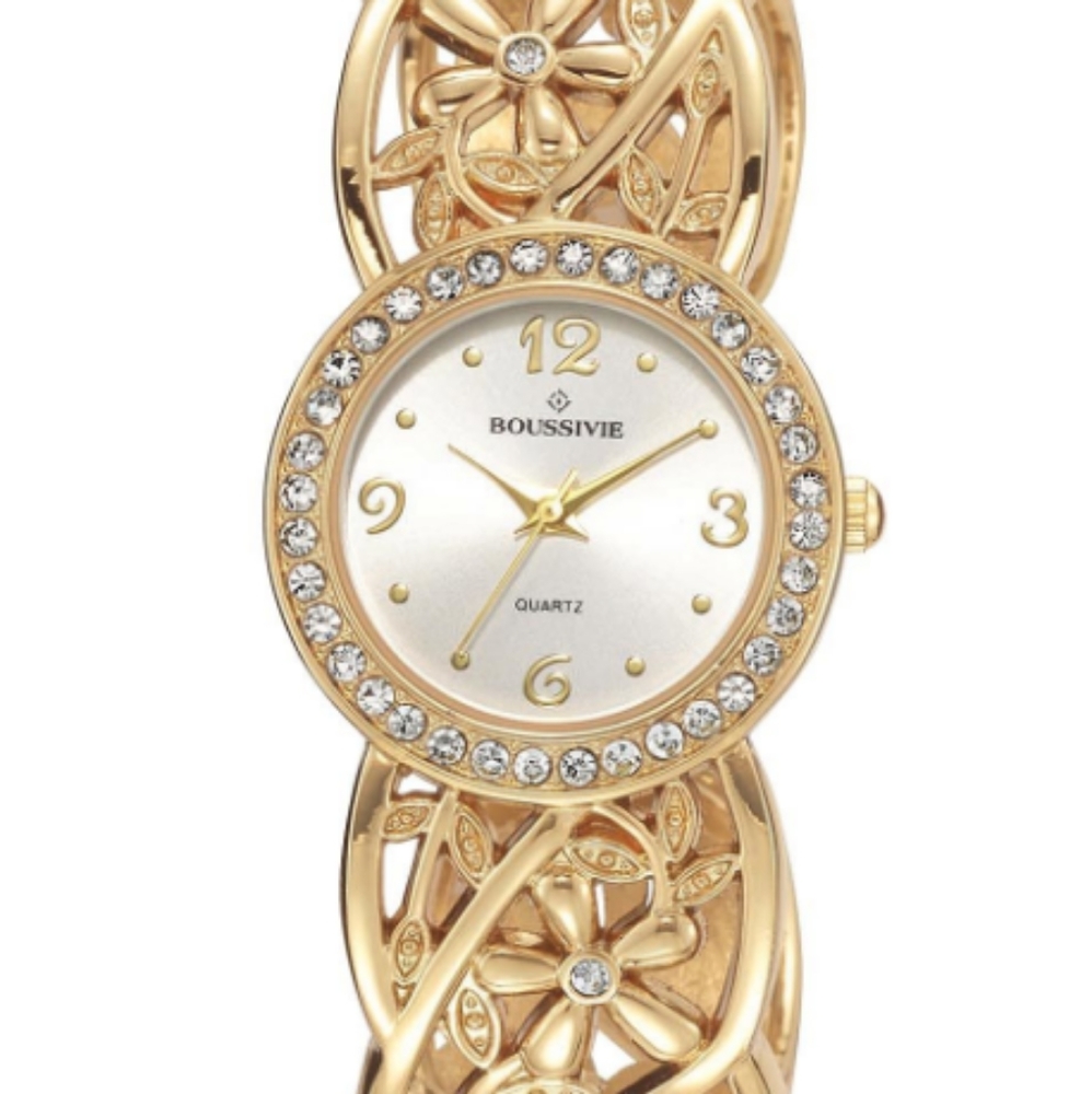 Filigree cuff watch
